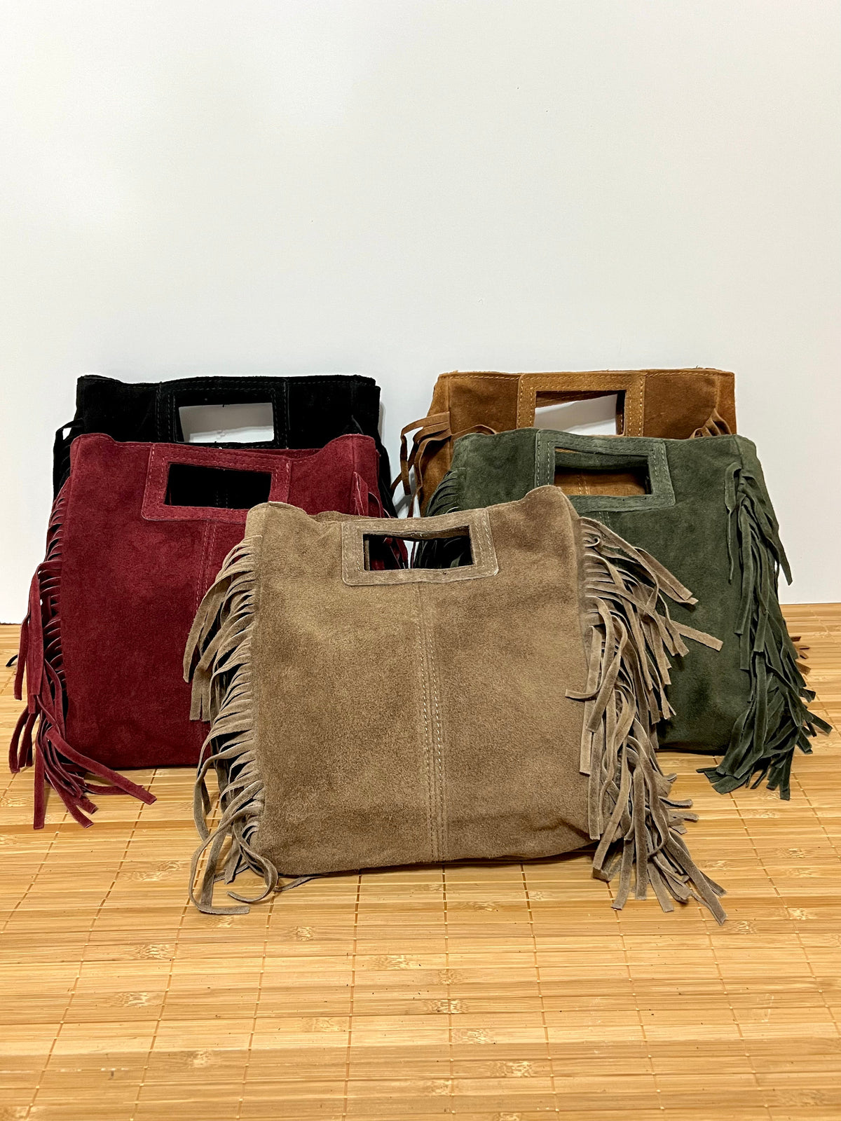 Bolsos de mano con flecos de piel serraje Minni Moon